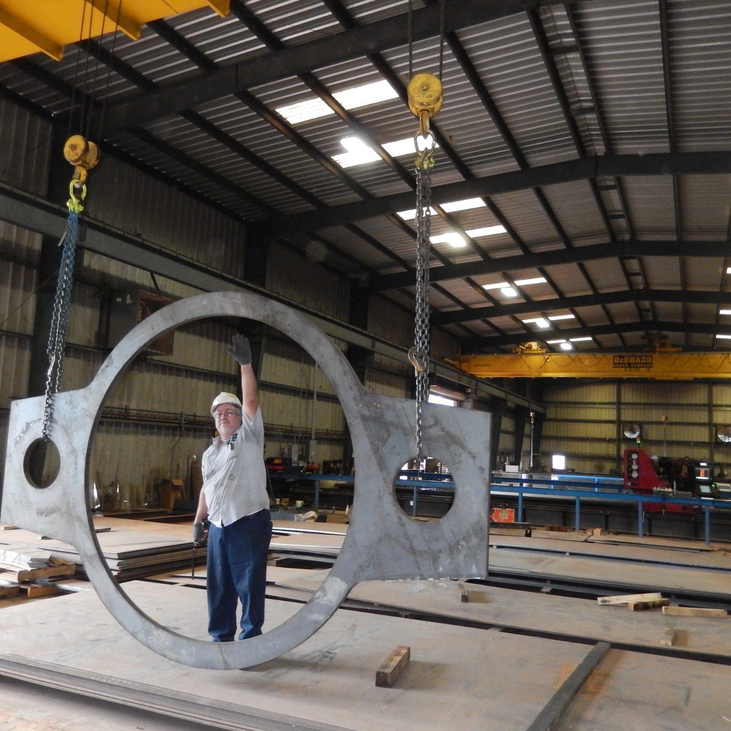 Large Flange Suspended from Crance for Display. Processing Services